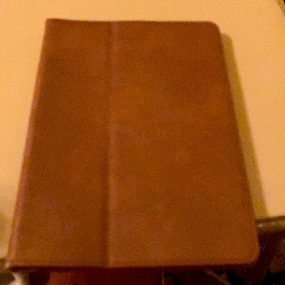 iPad case by Snugg.   7 x 9 1/2”